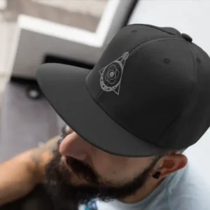 Side view of the Quantum Pulse Silver Cap showing the metallic silver thread embroidery against the high-quality black fabric.